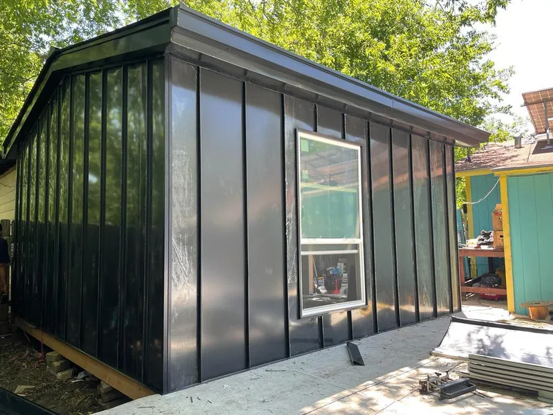 Black standing seam metal wall panels for Roof Inspection in Bellevue